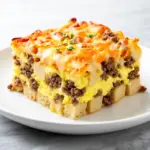 cheesy sausage and egg breakfast casserole - featured image
