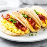 crispy bacon and egg breakfast tacos - featured image