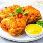 crispy baked coconut curry chicken thighs - featured image
