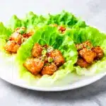 crispy sesame chicken lettuce wraps - featured image