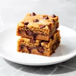 gooey peanut butter blondies with chocolate chips - featured image