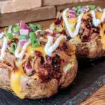 loaded pulled pork baked potatoes - featured image
